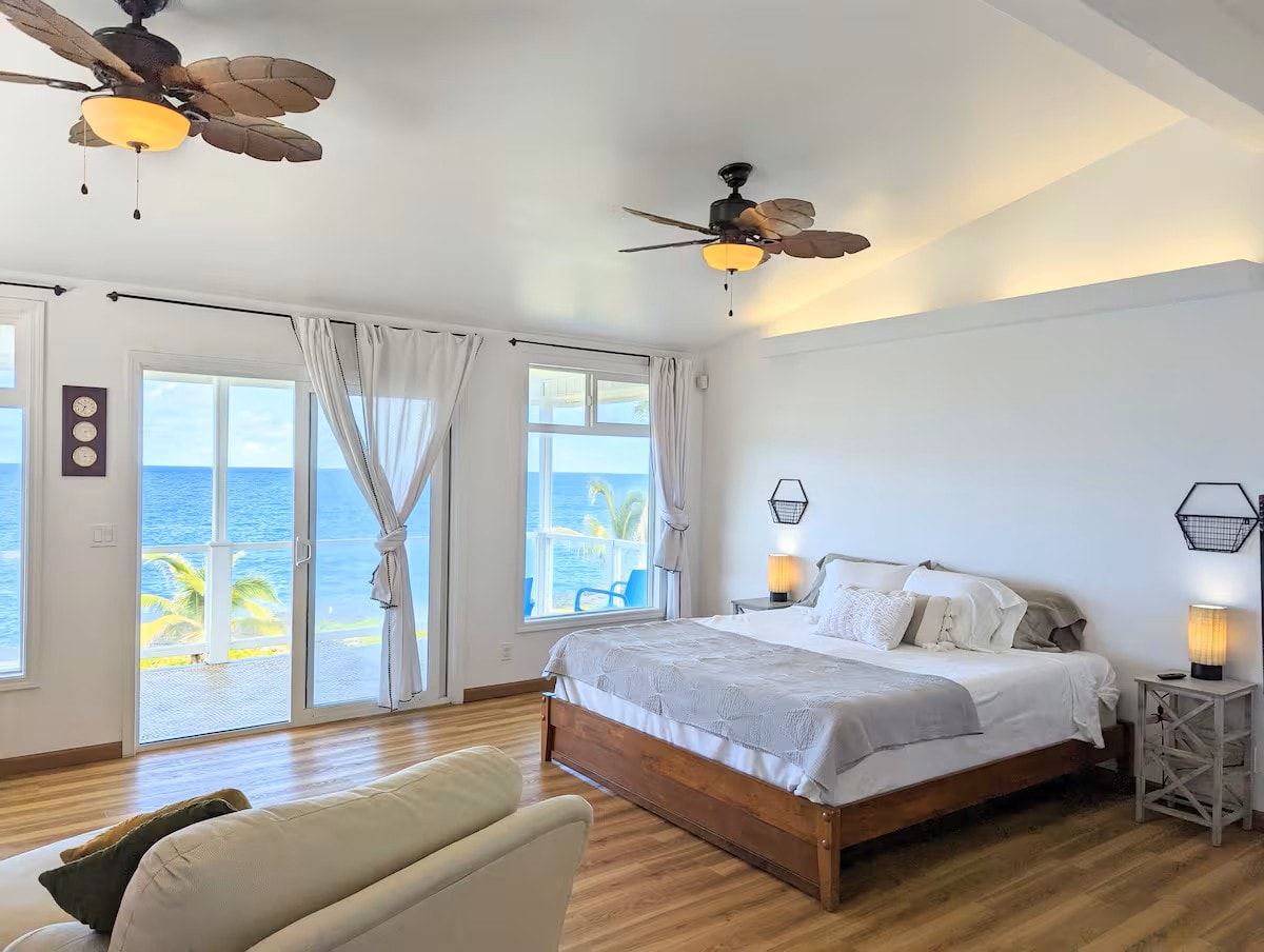Primary suite with king bed and lanai access