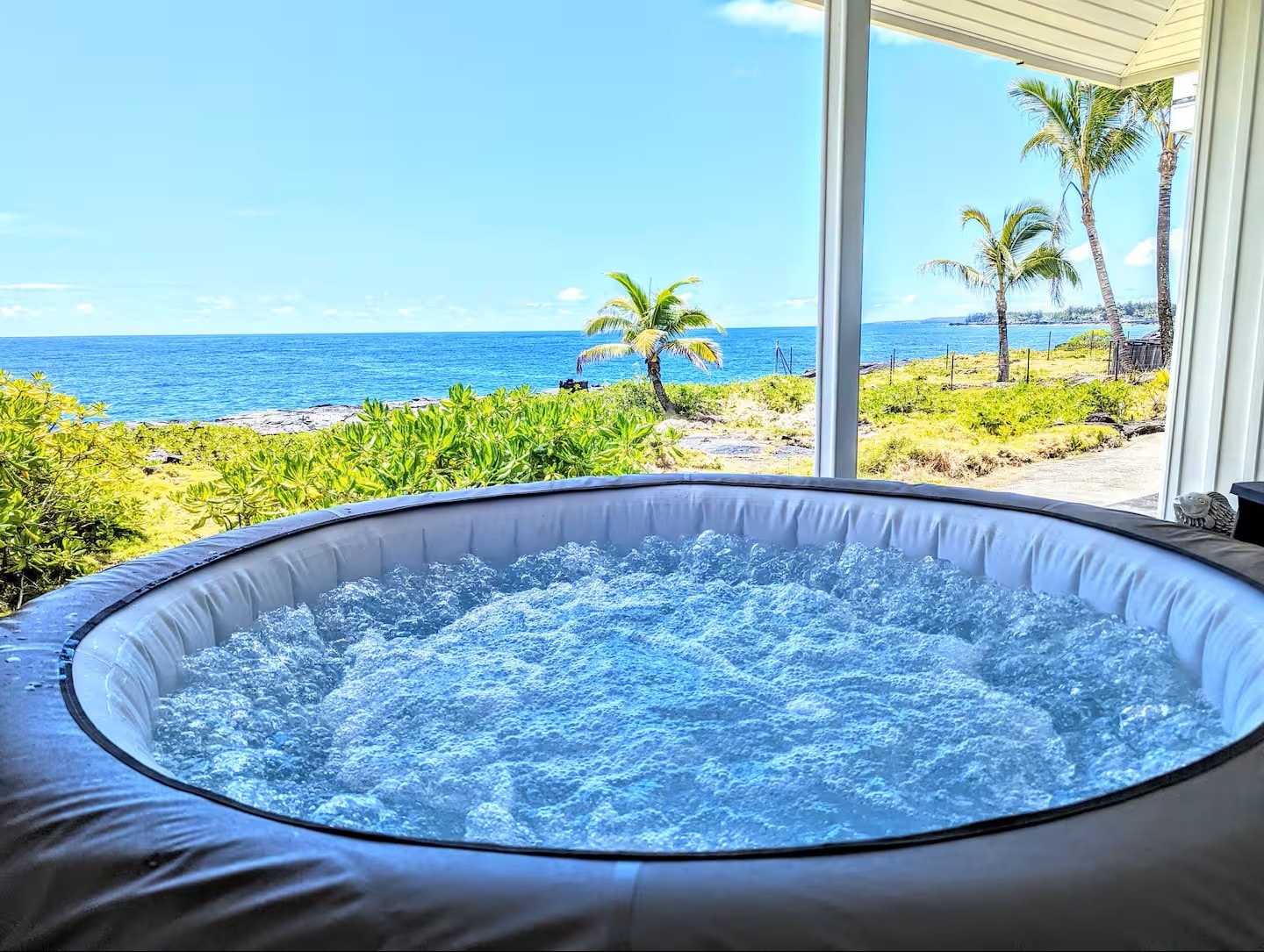 Soft side soaking tub with panoramic ocean view