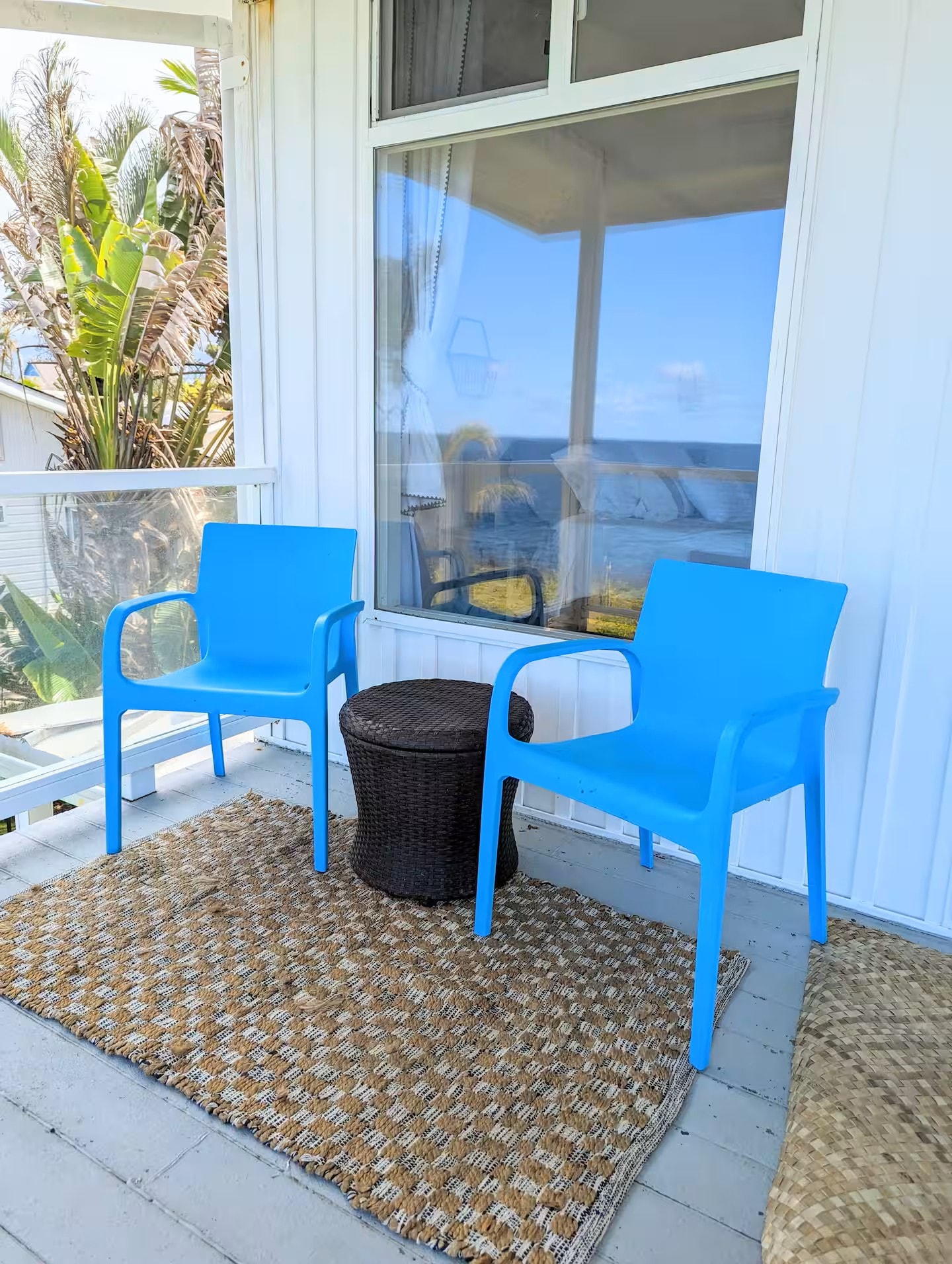 Tropical lanai with ocean view at sunset